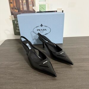 Prada Black Patent Pointed Slingback Heels with Logo Plaque